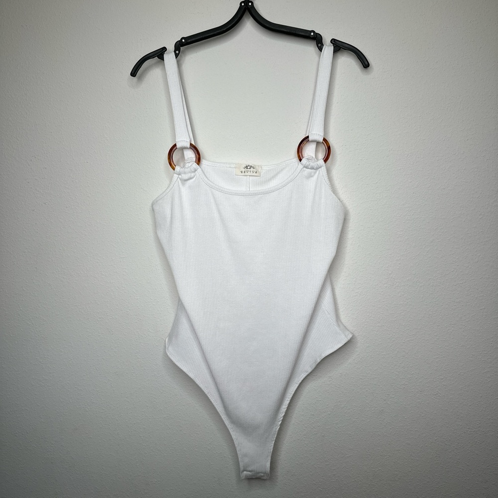 Revive White ribbed Bodysuit with Brown ring detail on the straps Details